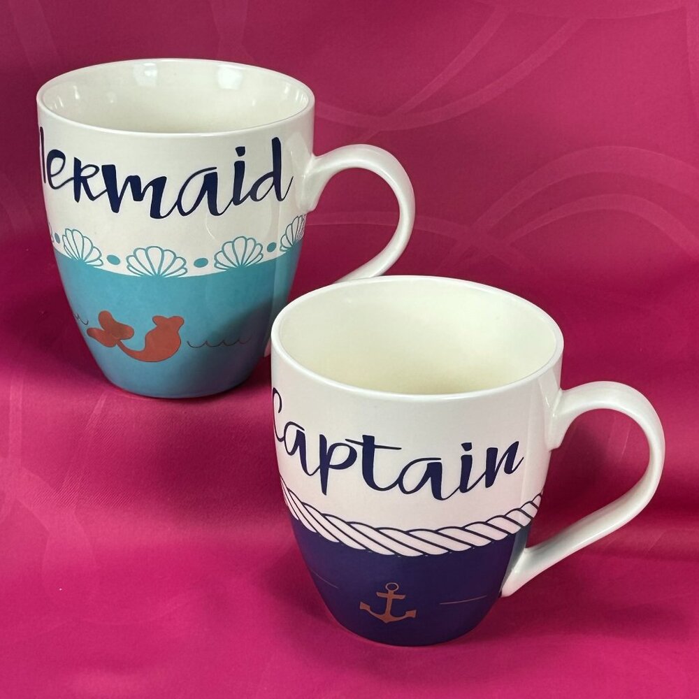 Pair of Cypress Home colorful coffee Mugs. Mermaid & Captain